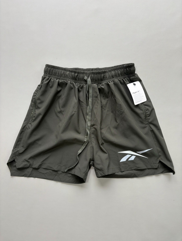 شورتک مردانه ریبوک مدل بغل چاکدار آیرو
